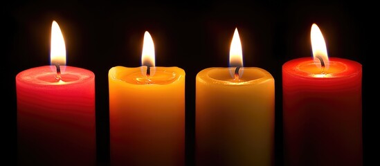 Poster - Warm candle lights illuminating darkness in winter season creating a cozy and inviting atmosphere