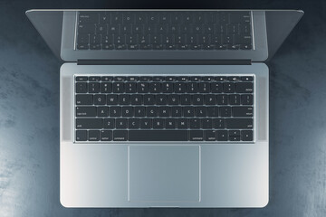 Poster - Top view on modern laptop with black keyboard on abstract dark concrete surface. 3D rendering
