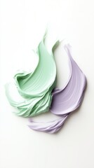Poster - soft pastel paint swirls in green and purple create an artistic blend on a white canvas surface