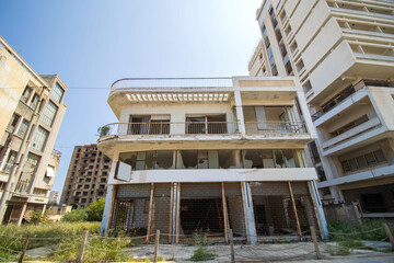 Wall Mural - View of abandoned buildings in the Varosha (Kapali Maras) ghost town in the sunny day, Cyprus