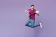 © ViDi Studio - Full body young man wear violet t-shirt casual clothes hold point on gift certificate coupon voucher card for store isolated on plain pastel light purple background studio portrait. Lifestyle concept.