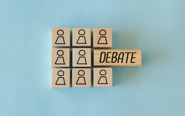 Wooden Blocks with the text: Debate on blue background.