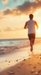 Wall Mural - Man jogs along the beach during sunset near the ocean waves on a warm evening