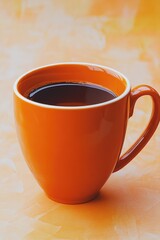 a cup of coffee sitting on a table with no one around