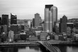 Pittsburgh City Skyline over the Monongahela River in Pennsylvania, USA: A retro-style black and white photo