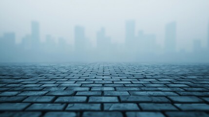 Poster - A foggy cityscape with a cobblestone foreground, creating a mysterious and atmospheric scene.