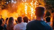 © Yotsaran - Audience Enjoying Live Performance with Fireworks and Colorful Lights at Outdoor Concert Event