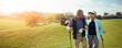 © BuyoutReese09/peopleimages.com - Golf, outdoor and senior couple on course for sports at country club together for leisure activity. Lensflare, happy and elderly man and woman people playing game in retirement for bonding in nature.