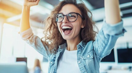 Canvas Print - A woman with curly hair and glasses is smiling