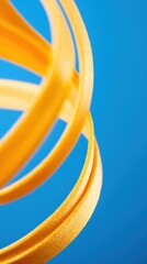 Poster - Dynamic yellow ribbons in motion studio setting abstract vibrant colors close-up view visual art concept