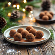 © Lizbond - Holiday truffles dusted with cocoa on a rustic plate in a festive setting