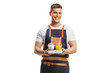 © Ljupco Smokovski - Waiter holding takeaway coffee and orange juice