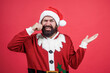 © be free - xmas shopping time. prepare gifts and presents. just have fun. happy bearded mature man in santa claus costume. new year party. celebrate winter holidays. merry christmas to you. presenting product