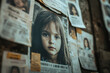 © Infinity Lens - A wall covered with missing children posters, each featuring a child's photo and details.