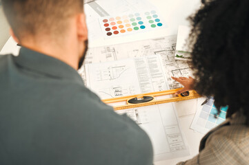 Fototapete - Office, teamwork and business people with blueprint for architecture, planning or project management. Collaboration, employees and architects by above with floor plan, building design or spirit level