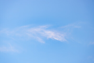 Wall Mural - a beautiful sky tinted by the sun leaving vibrant shades of gold, pink, blue and multicolored. cloud