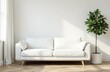 © Margarita Serenko - In a cozy living room, there sits a white couch positioned next to a vibrant potted plant, enhancing the overall decor of the space