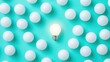 © pham - 明るい電球が置かれた多数の白いボールの周りの静かな空間