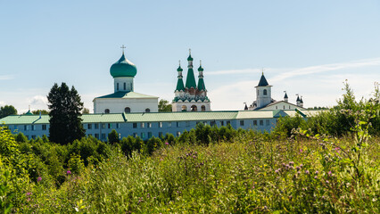 Wall Mural - Lodeynoye Pole, Russia, July 9, 2024. Field in front of the Trinity section of the Alexander Svirsky Monastery.