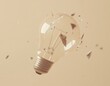 © pham - 粉々になった電球が空中に浮かんでいる様子とその周囲の飛散物