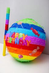 Wall Mural - bright round colorful pinata with candies for children's birthday