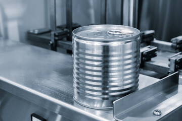 Poster - Metal can for canning in a food factory, on a metal packaging conveyor