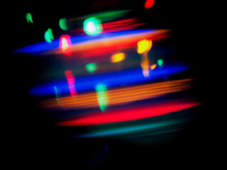 Wall Mural - a colorful, blurry background with a rainbow of colors. the colors are bright and vibrant, creating 