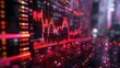 © hazia - Red stock market graph on screen at night.