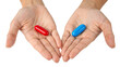 © Stock Spectrum - Two Hands Holding Red and Blue Pills, Isolated on White Background Choice Concept,  pill, choice, medicationKeywords  pill, choice, medicine, decision