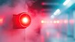© Jiraporn - Red warning light in a smoky environment, vibrant colors and an industrial setting.