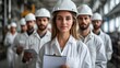 © Thanaporn - A medium shot of a diverse group of young male and female factory professionals specializing in quality control, posed against a white background,