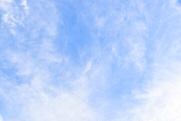 Wall Mural - beautiful blue sky and white fluffy group of clouds with sunrise in the morning, natural background