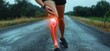 © mobile - Knee Injury and Joint Pain in Runners Sportswoman with Tendon Inflammation on Asphalt Road