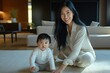 © InfiniteStudio - Cheerful Asian woman engages with toddler on modern living room floor during playful afternoon