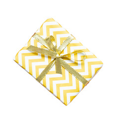 Wall Mural - yellow gift box with gold ribbon bow.