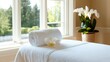 © MarkFinal - Serene Spa Retreat with Fresh Towels and Elegant Orchid for Ultimate Relaxation in a Bright and Tranquil Setting Surrounded by Nature Beauty
