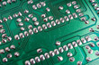 © Alexander - The back side of an electronic circuit board with connecting tracks close-up
