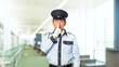 © metamorworks - セキュリティ、パトロール、警察官、警察、警官、警備員、静かに、内緒、秘密、警備、防犯、騒音、防音、機密、警備会社、防災、制服、守衛、ガードマン、門番、お巡りさん、交番、巡査、職業、仕事、アルバイト、中年、ミドルエイジ、男性、日本人、巡回、監視、取り締まり、見守り、安全、キープクワイエット、オフィス、図書館、施設、迷惑、通報、スローモーション、ビル、ホール、ラウンジ、博物館、病院、イベント、美術館、