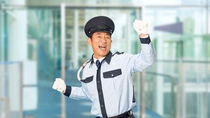 Poster - ビルのエントランスで踊る男性警備員