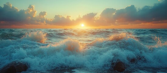 Aufkleber - Tranquil seascape at sunrise with waves crashing against rocks under a colorful sky backdrop showcasing nature's beauty and serenity.