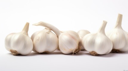 Aufkleber - Fresh garlic bulbs arranged artistically on a white background showcasing their natural texture and color for culinary or health purposes.