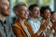 © Sachin - Diverse Group of Business Professionals Applauding in a Meeting Setting