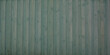© OceanProd - Background green line wooden fence planks texture in wood wallpaper in panoramic web format and header