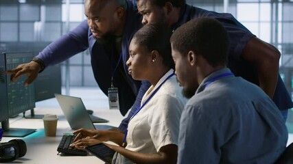 Poster - team of data center technicians maintaining company network infrastructure by configuring and troubl