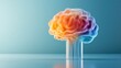 ©  lukaPixMedia - A colorful, abstract representation of a human brain encased in a glass tube, resting against a blue background, symbolizing creativity and containment.