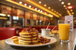 © Marina - Delicious pancake stack with bacon and syrup in retro diner atmosphere