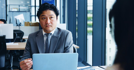 Aufkleber - Talking, consulting and man with client, office and laptop for inquiry, medical info and life insurance. Bank, underwriter and explaining of premium rate, people and application in firm and Japan