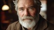 © Екатерина Чумаченко - Portrait of a handsome senior man with grey beard and mustache.