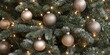 © DigitalDreamLab - Glittery Gold Christmas Ornaments on Tree with Lights