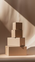 Poster - stacked cardboard boxes arranged on a soft beige background with warm light highlighting their shape